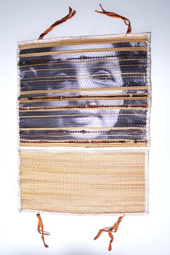 woven mat featuring the face of a woman