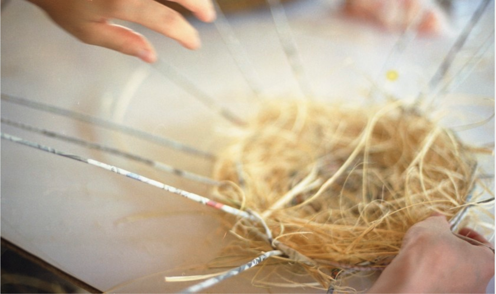 Nilofar Akmut weaves a basked at Womanifesto Workshop 2001