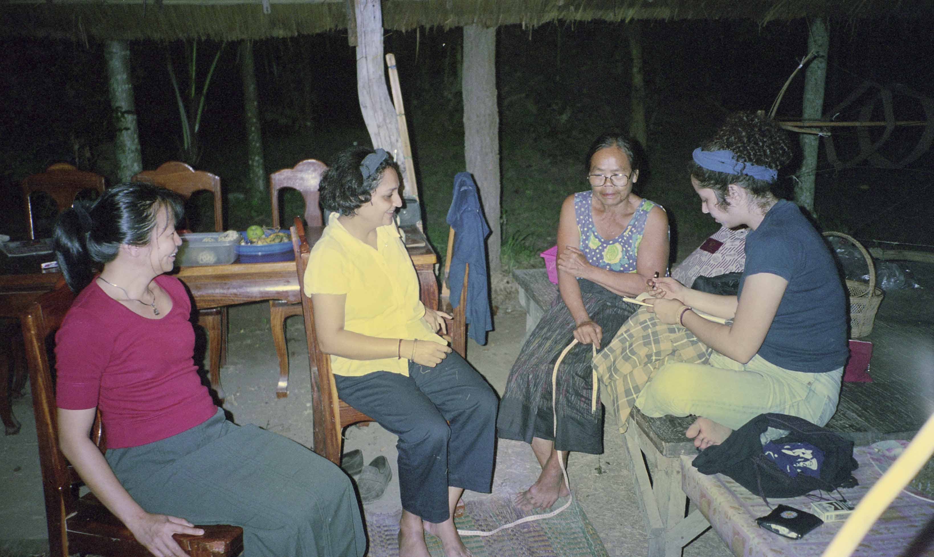 group sitting and mending at womanifesto workshop 2001