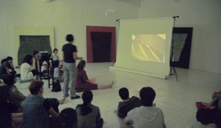 Presentation at About Cafe (Set of 35 Photographs)